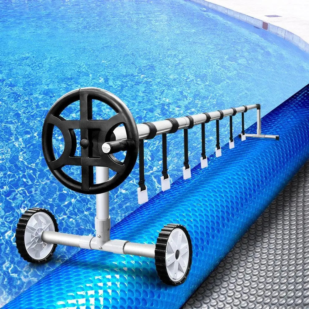 Aquabuddy Pool Cover with Aluminium Roller, showcasing a blue solar blanket and silver roller for efficient pool maintenance.