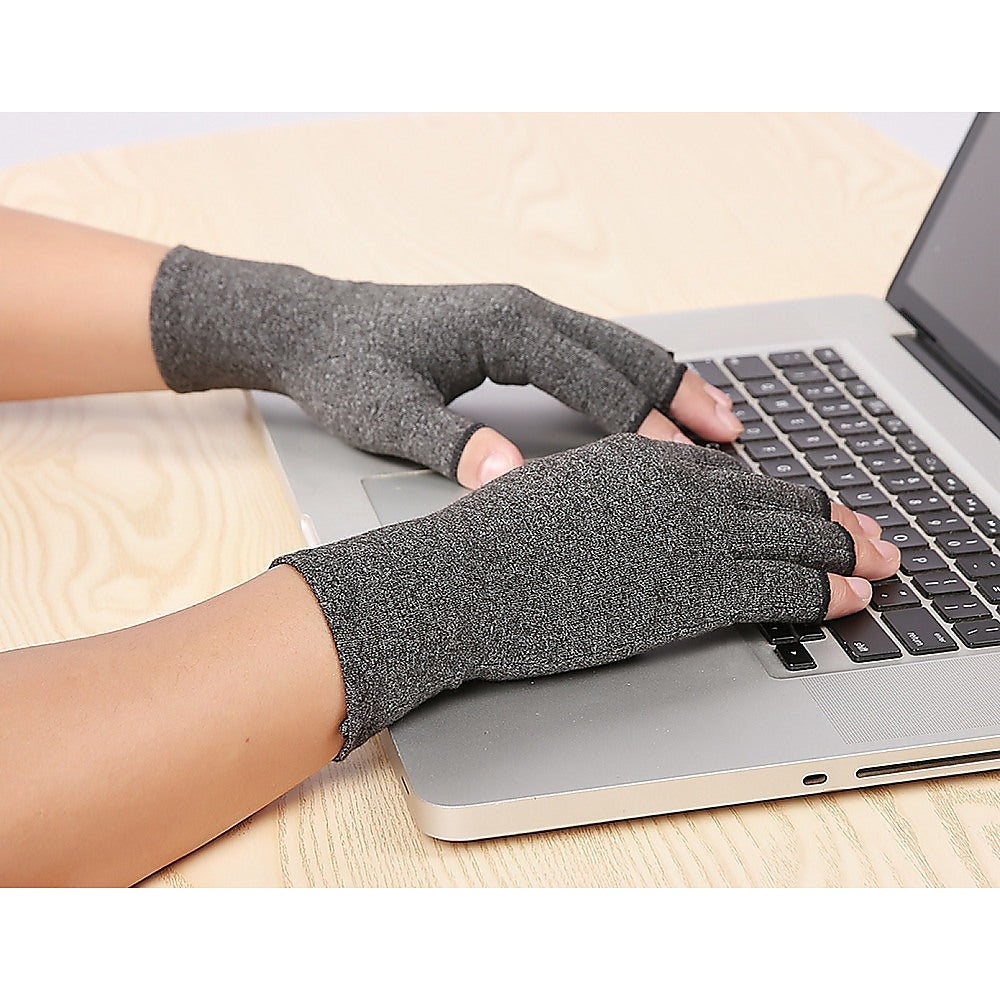 A pair of grey Arthritis Gloves Compression Joint Finger Hand Wrist Support Brace, designed for comfort and mobility with open fingertips.
