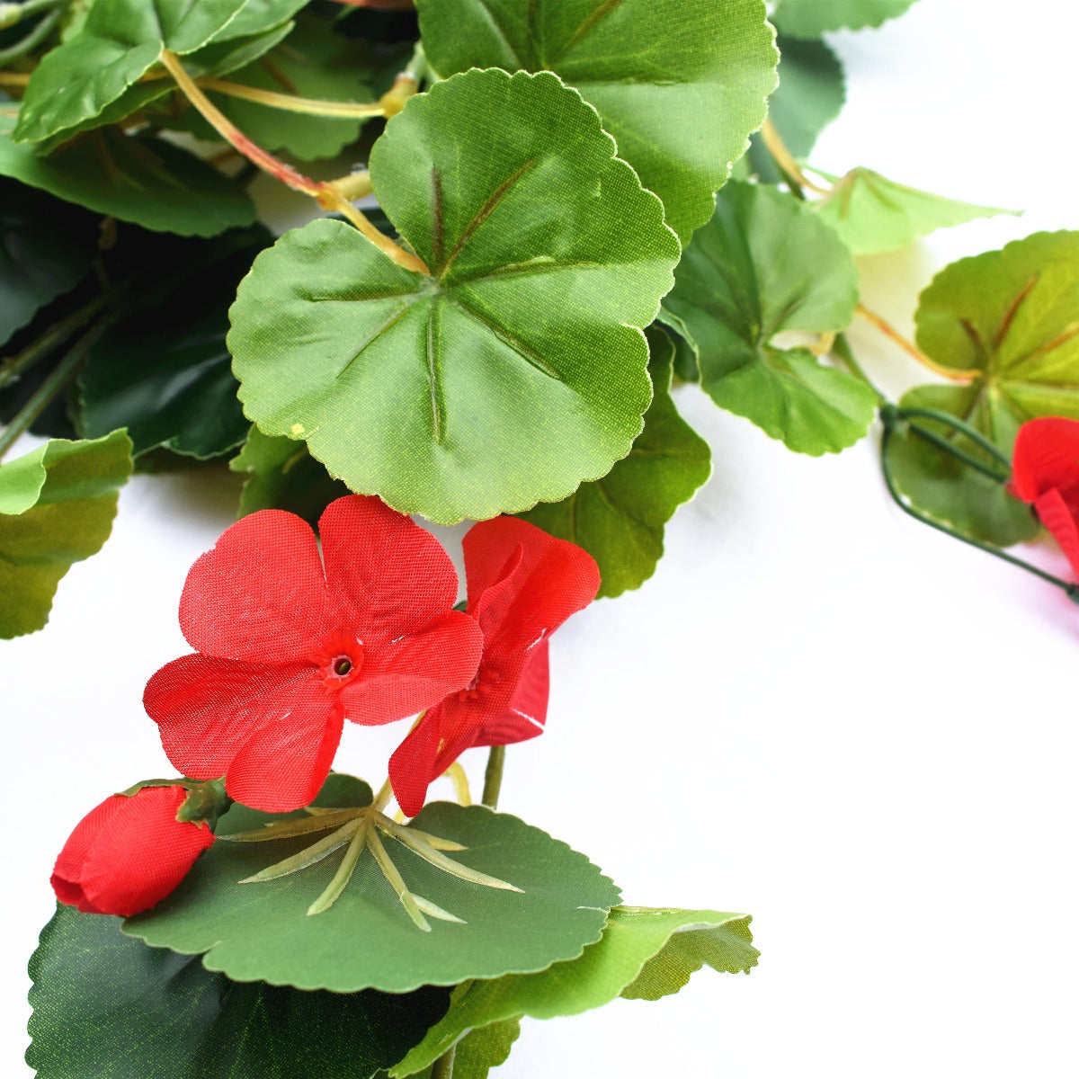 60cm Artificial Geranium Hanging Bush with vibrant red flowers and lush green leaves, perfect for indoor decoration.