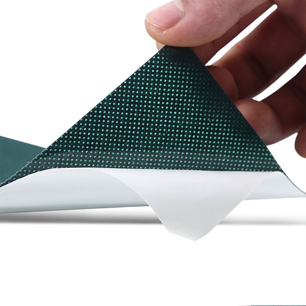 Rolls of self-adhesive synthetic turf joining tape on a white background, showcasing its durable non-woven fabric and easy-to-use design.