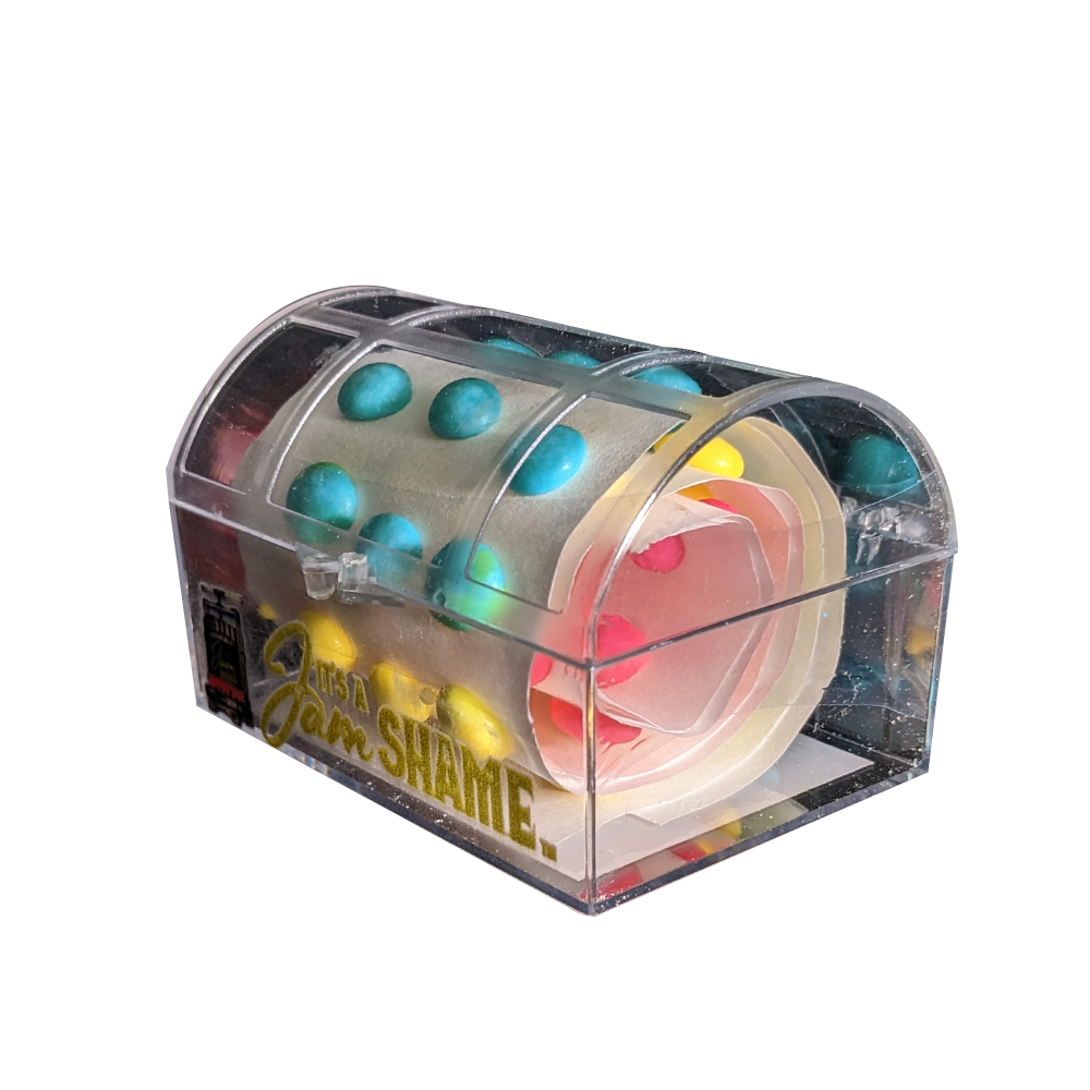 A display of 8 assorted candy crystal boxes shaped like treasure chests, filled with colorful candies including Bananamania, Candy Stars, and more.