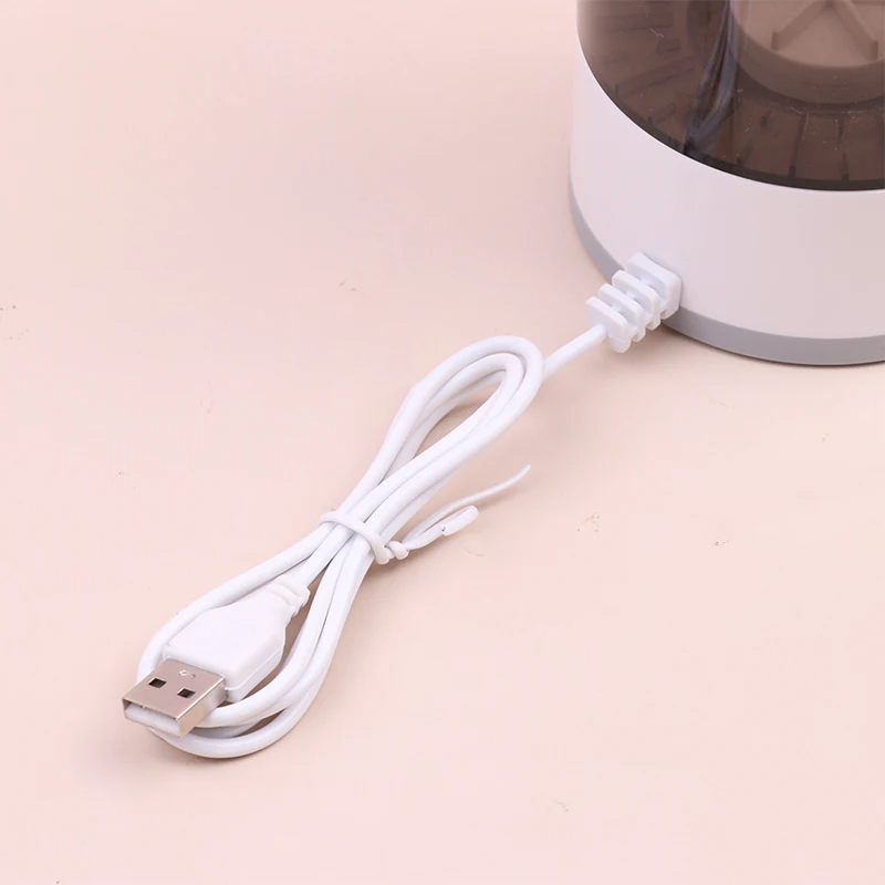 Automatic Brush Cleaner Electric Makeup Brush Cleaning Machine in white and rose gold, designed for fast and effective cleaning of makeup brushes.
