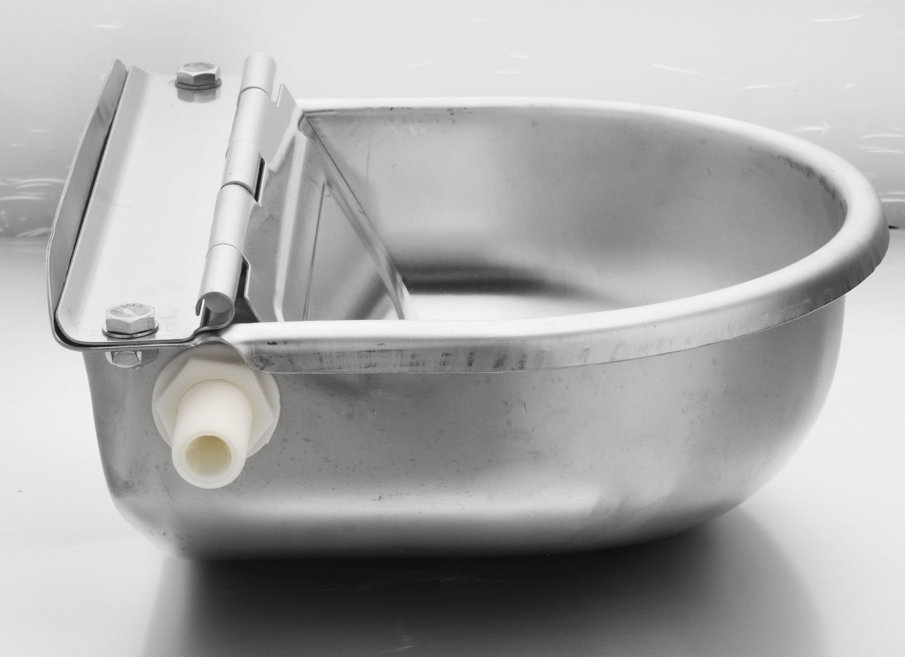 Automatic Water Bowl made of stainless steel with a float mechanism, designed for easy access and maintenance for pets.