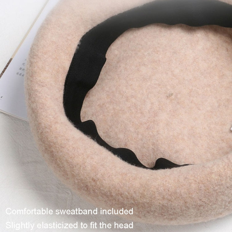 A stylish Autumn Winter Embroidered Warm Wool Hat for women, featuring intricate embroidery and a comfortable fit, perfect for outdoor leisure activities.