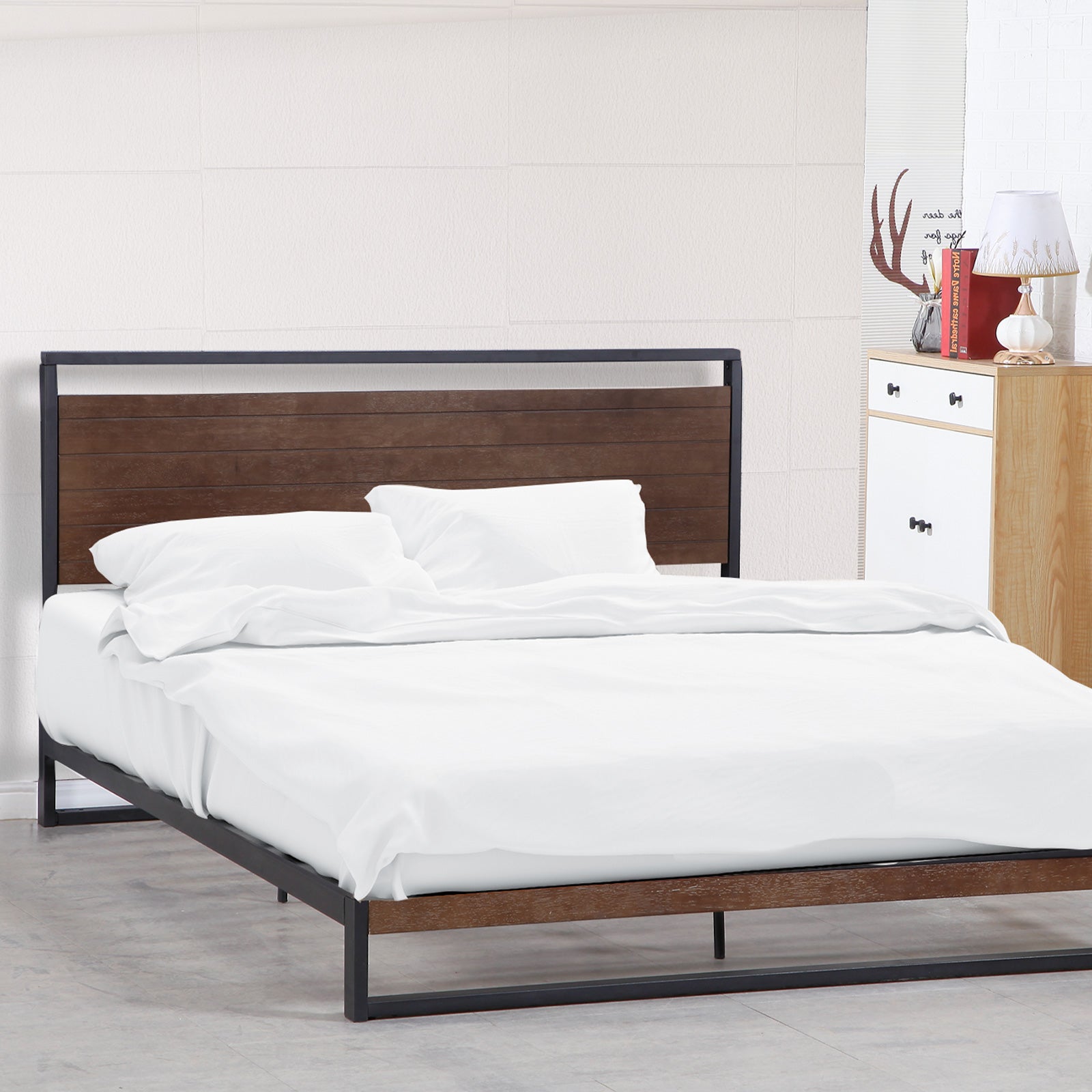 Azure wood bed frame with a Comforpedic mattress, showcasing a modern design with a headboard and neutral colors.