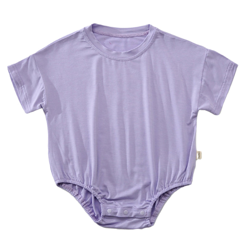 Baby unisex solid color rompers in various colors including pink, blue, green, and yellow, made from soft cotton blend fabric.