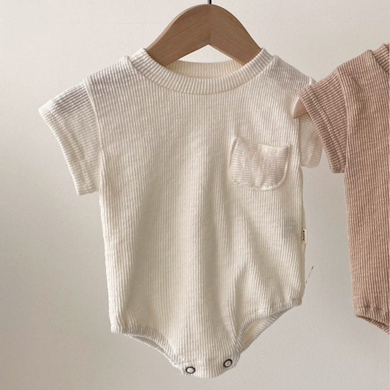 Baby unisex solid color rompers in white and coffee, suitable for ages 0-24 months, made from soft cotton blend fabric.