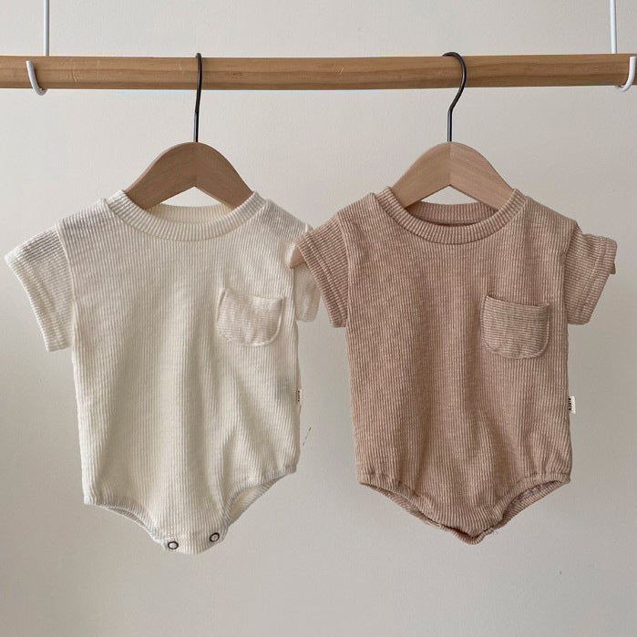 Baby unisex solid color rompers in white and coffee, suitable for ages 0-24 months, made from soft cotton blend fabric.