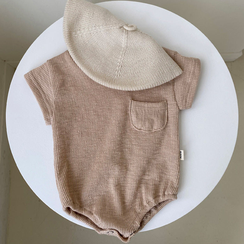 Baby unisex solid color rompers in white and coffee, suitable for ages 0-24 months, made from soft cotton blend fabric.