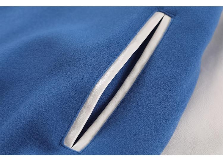 Men's baseball jacket featuring furry bear patchwork embroidery in black, blue, and pinkish red colors, perfect for casual streetwear.