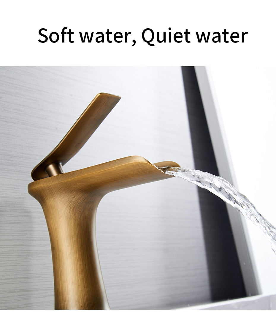 Basin Faucets Waterfall Bathroom Faucet in chrome finish with single handle design, showcasing elegant waterfall flow.