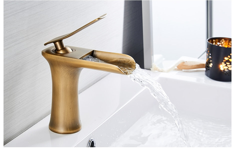 Basin Faucets Waterfall Bathroom Faucet in chrome finish with single handle design, showcasing elegant waterfall flow.