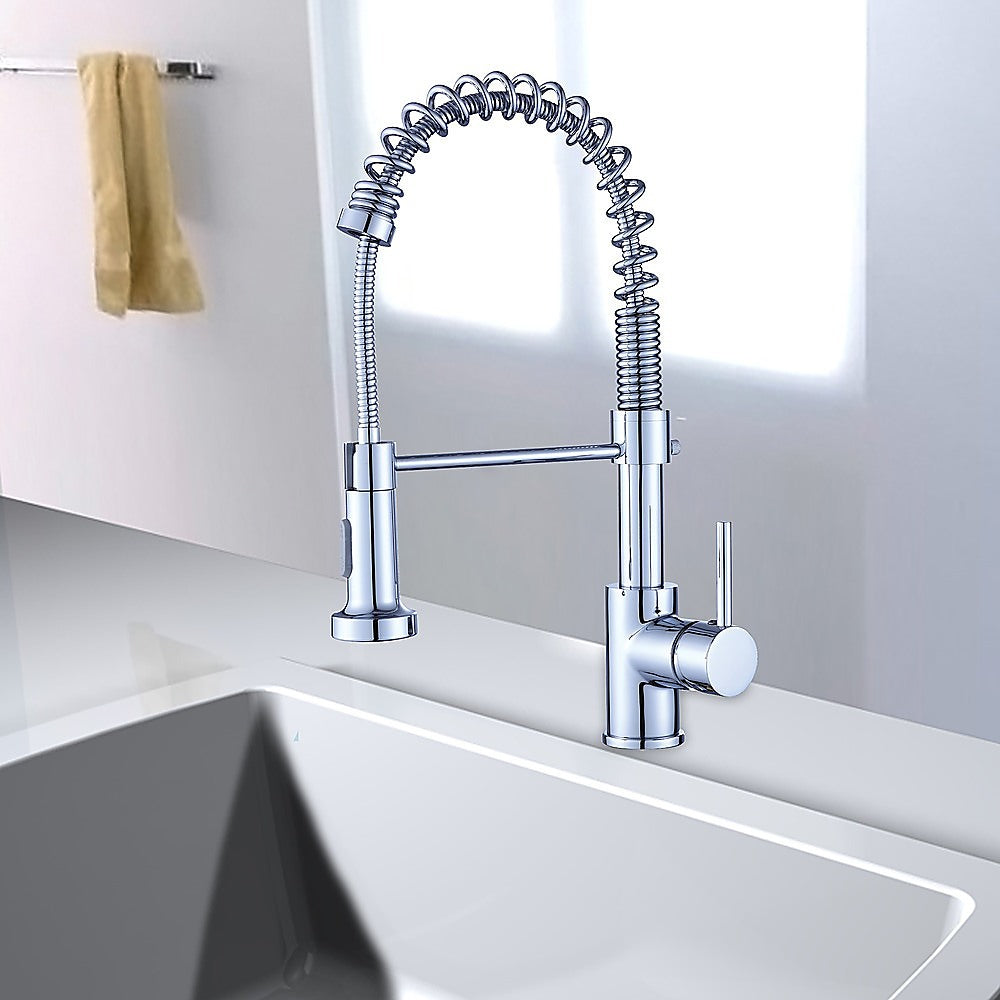 Della Francesca Basin Mixer Tap Faucet with a polished chrome finish and pull-out handheld head, designed for kitchen and laundry sinks.