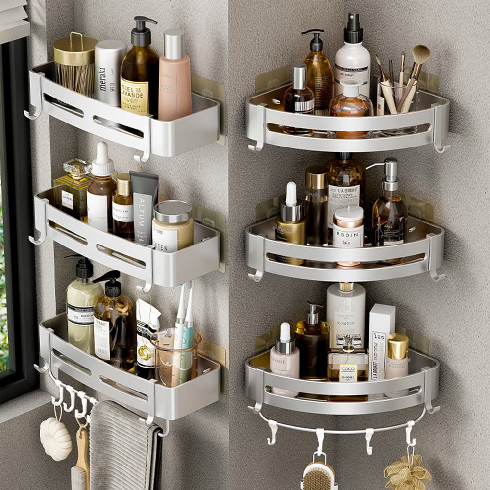 Wall-mounted aluminum shower corner shelves with hooks, designed for space-saving and organization in bathrooms.