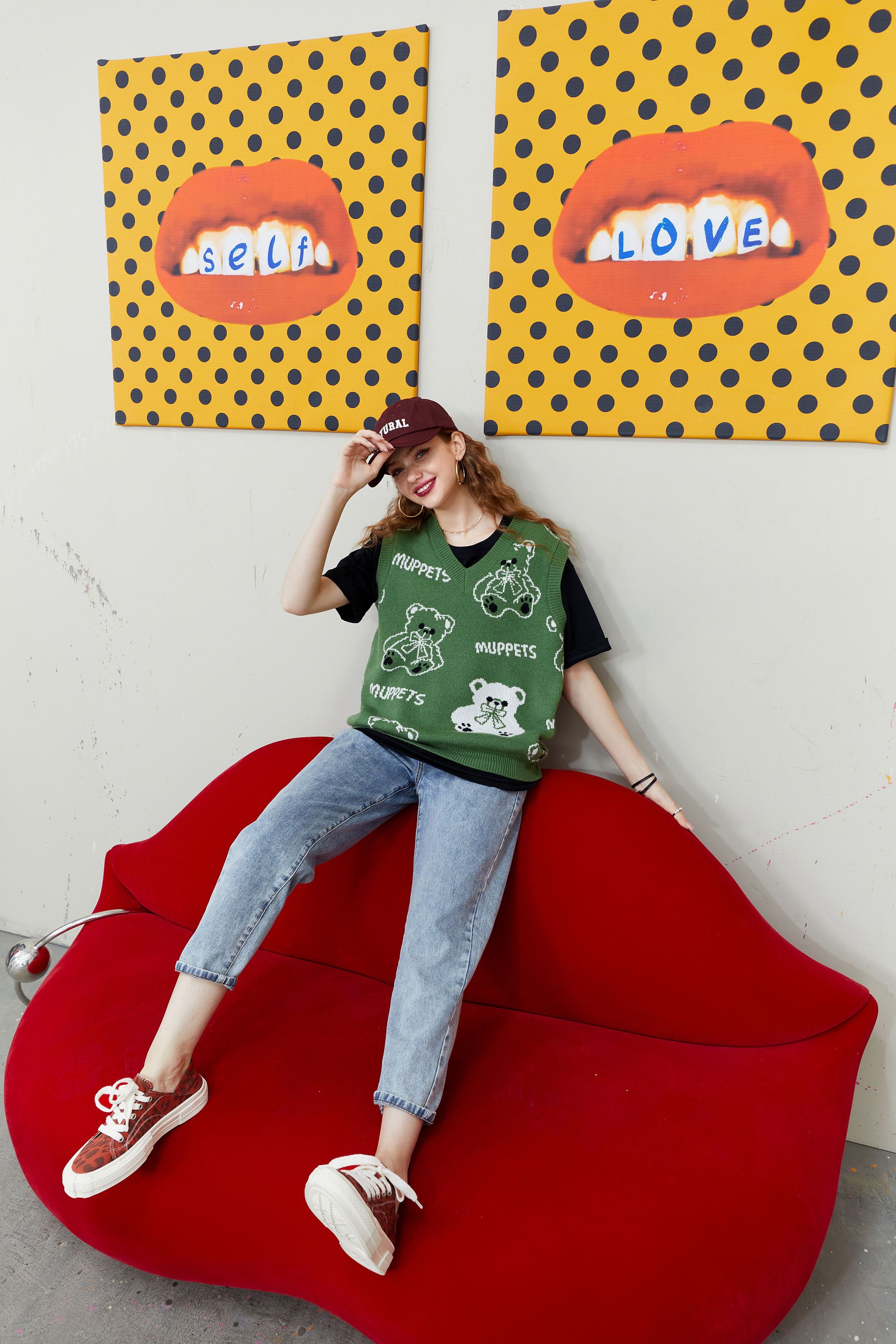 A stylish Bear Graphic Knit Pullover for women, featuring a cute bear design and a V-neck, perfect for autumn casual wear.