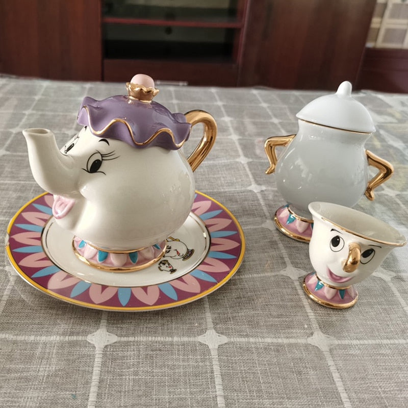 Beauty And The Beast Teapot Set featuring Mrs. Potts and Chip, crafted from ceramic with a charming design.