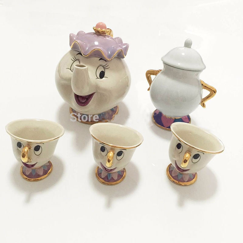 Beauty And The Beast Teapot Set featuring Mrs. Potts and Chip, crafted from ceramic with a charming design.