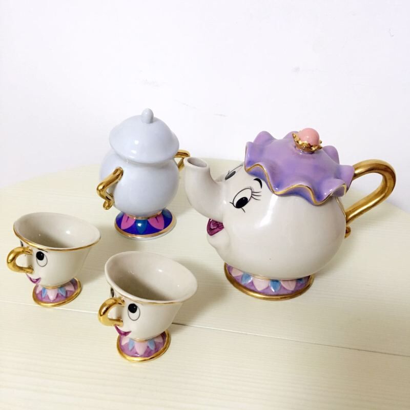 Beauty And The Beast Teapot Set featuring Mrs. Potts and Chip, crafted from ceramic with a charming design.