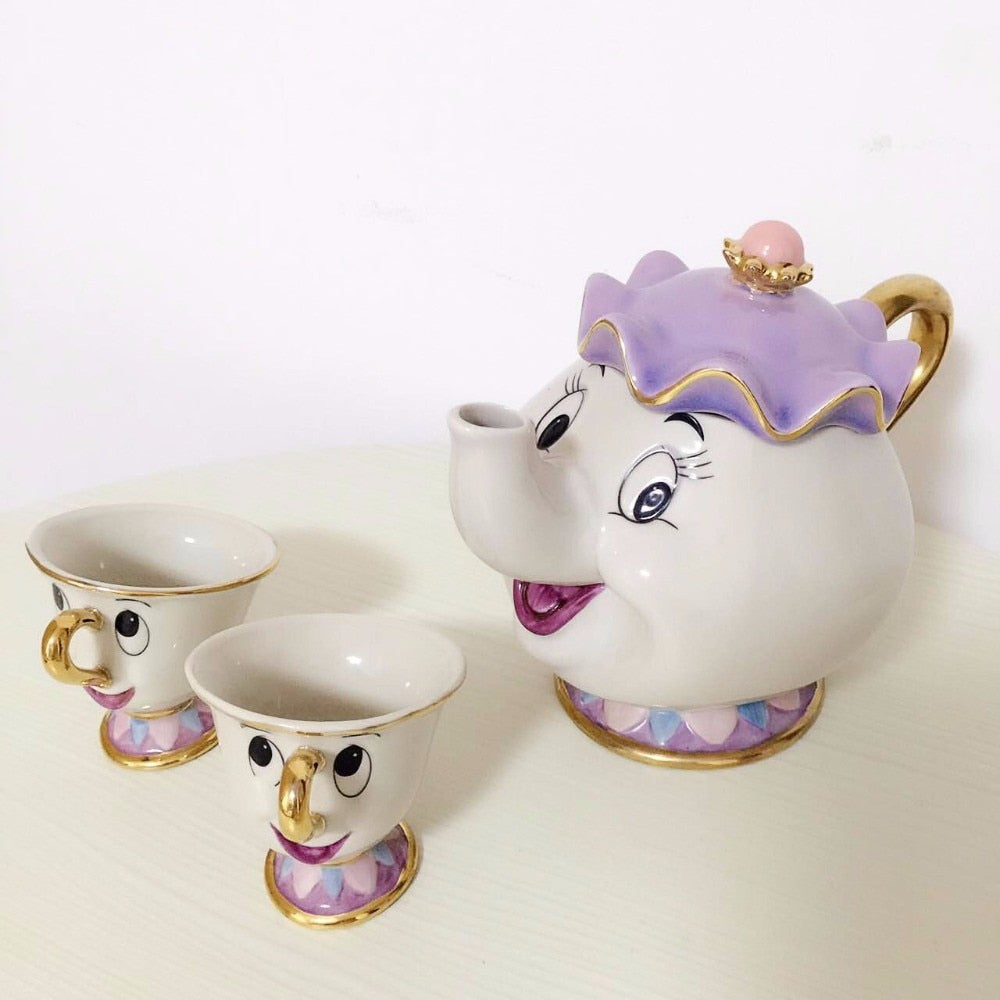 Beauty And The Beast Teapot Set featuring Mrs. Potts and Chip, crafted from ceramic with a charming design.