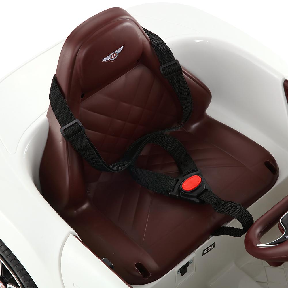 A luxurious red Bentley Kids Ride On Car with gullwing doors, designed for children, showcasing its sleek design and premium features.