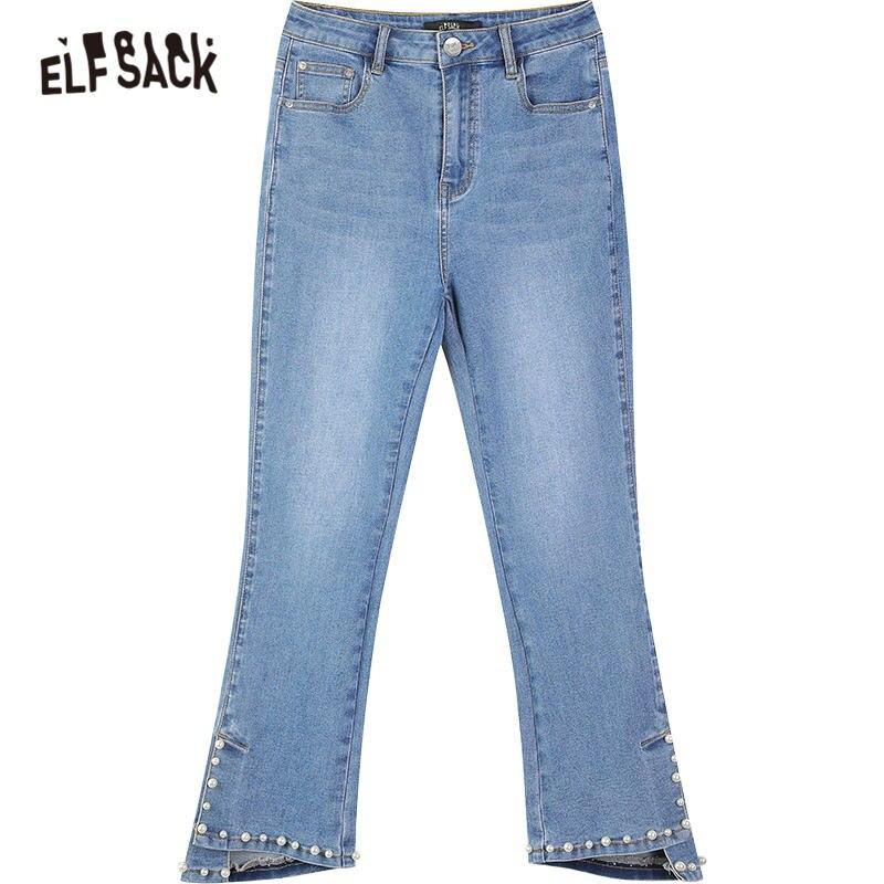 A pair of blue solid high waist washed casual flare jeans for women, featuring a minimalist design and ankle-length cut.