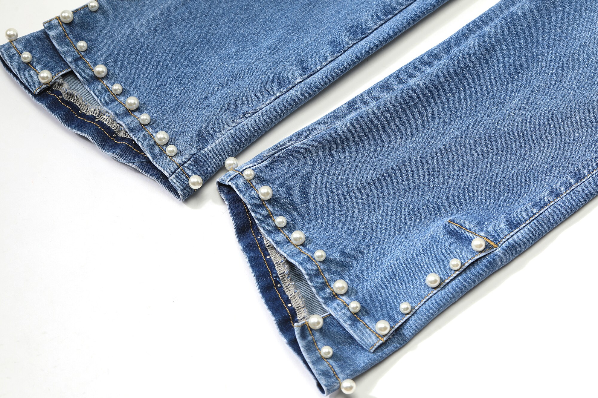 A pair of blue solid high waist washed casual flare jeans for women, featuring a minimalist design and ankle-length cut.