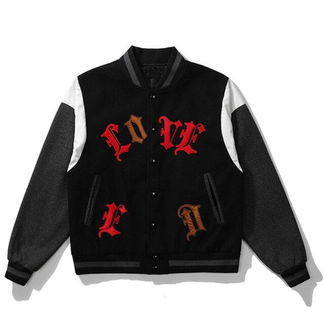 Men's bomber jacket featuring heart-shaped patch and letter embroidery, stylish patchwork design for autumn and winter wear.
