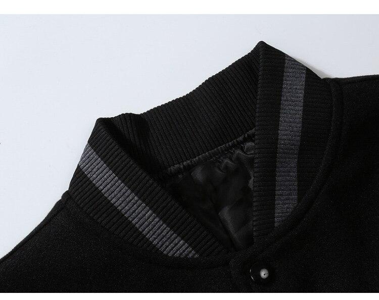 Men's bomber jacket featuring heart-shaped patch and letter embroidery, stylish patchwork design for autumn and winter wear.