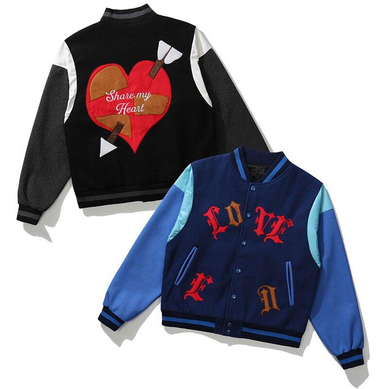 Men's bomber jacket featuring heart-shaped patch and letter embroidery, stylish patchwork design for autumn and winter wear.