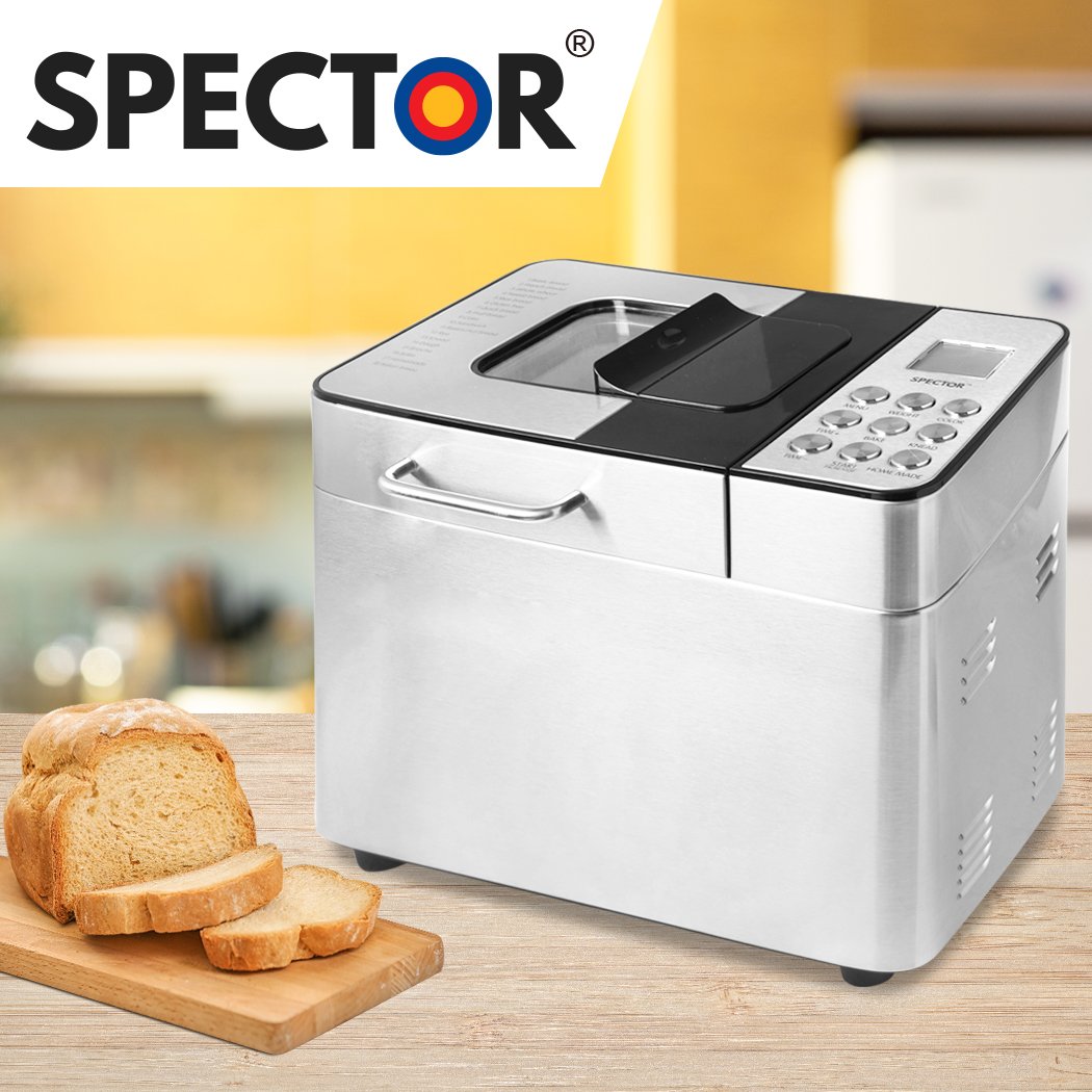 A sleek stainless steel Bread Maker Machine with a non-stick mixer paddle and kneading blade, showcasing its elegant design and LCD display.