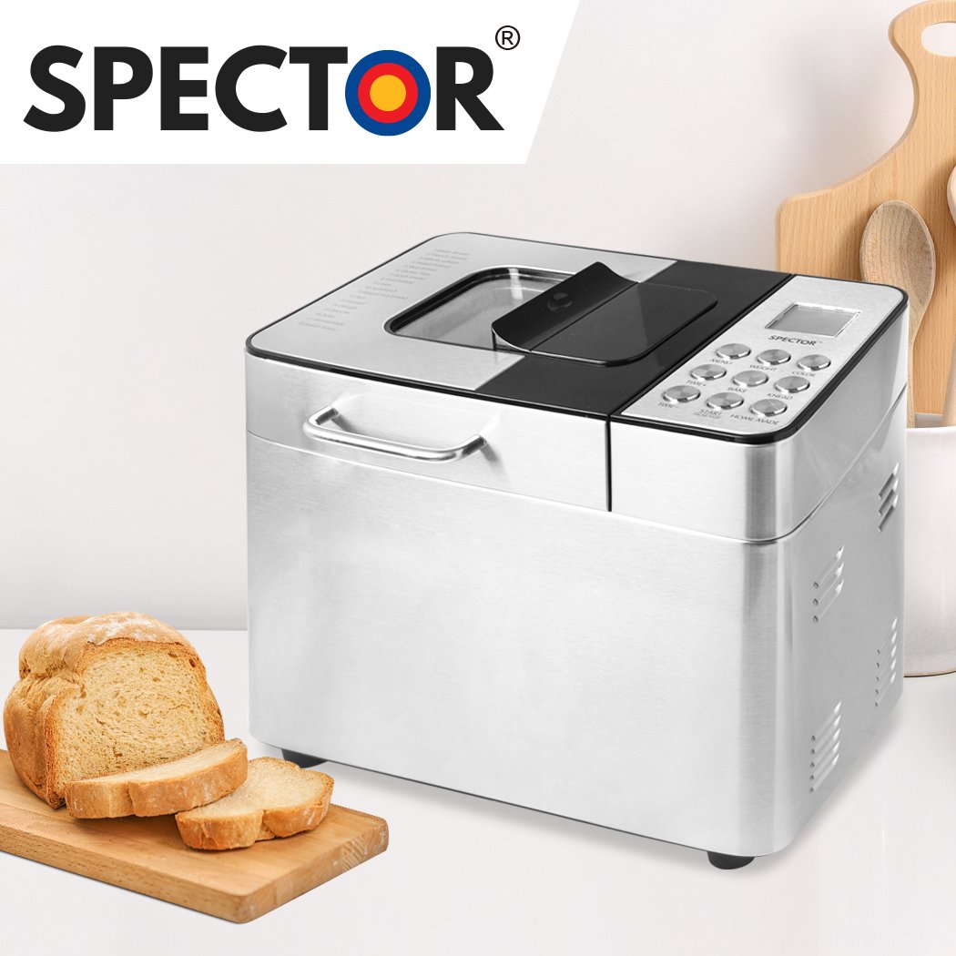 A sleek stainless steel Bread Maker Machine with a non-stick mixer paddle and kneading blade, showcasing its elegant design and LCD display.