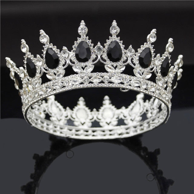 A beautiful Bridal Crown featuring metal and crystal embellishments, designed in a vintage water drop pattern, perfect for weddings and special occasions.