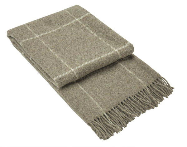 Brighton Throw blanket made from 100% New Zealand wool in a beige striped design, showcasing its soft texture and elegant appearance.