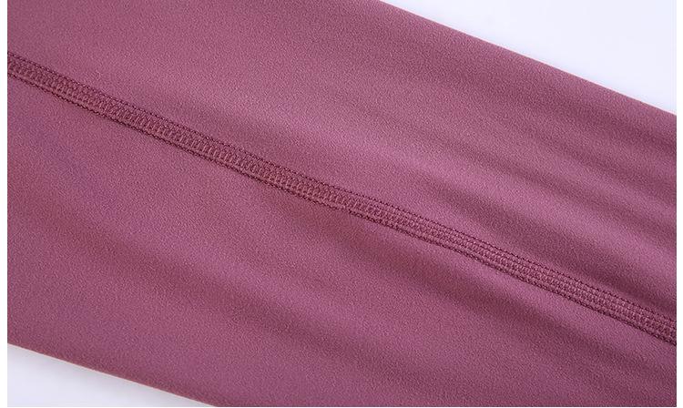 A pair of buttery-soft high rise yoga pants designed for pregnant women, showcasing their stretchy fabric and elastic waist.