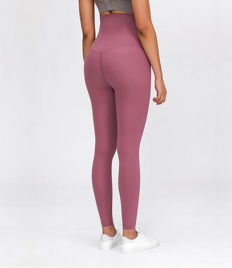 A pair of buttery-soft high rise yoga pants designed for pregnant women, showcasing their stretchy fabric and elastic waist.