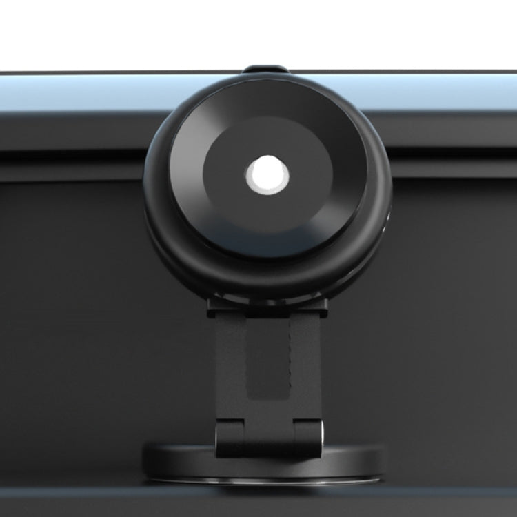 Car Electric Vacuum Suction Cup Mobile Phone Holder mounted on a dashboard, securely holding a smartphone with wireless charging feature.