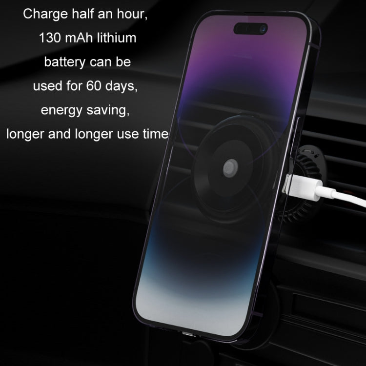 Car Electric Vacuum Suction Cup Mobile Phone Holder mounted on a dashboard, securely holding a smartphone with wireless charging feature.