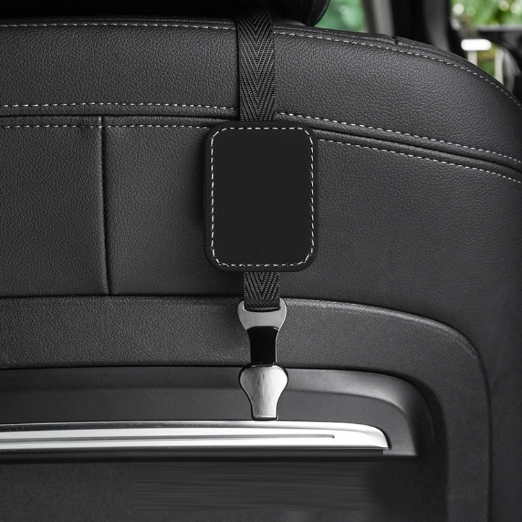 Black suede multifunctional hook for car rear seat backrest, showcasing its elegant design and sturdy construction.