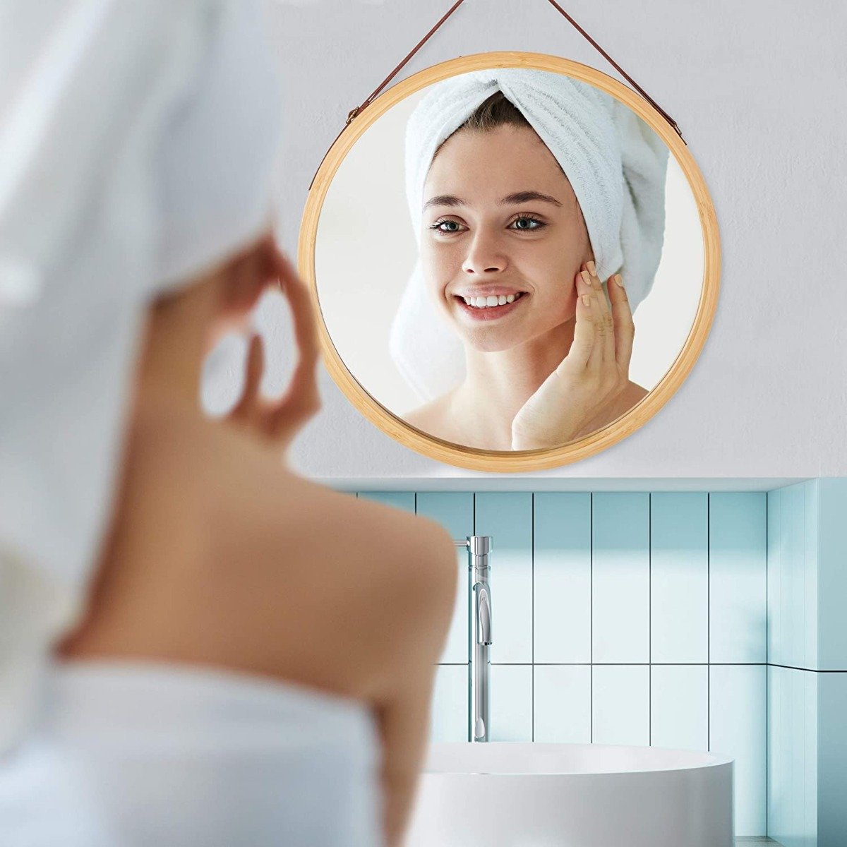 CARLA HOME Hanging Round Wall Mirror with a solid bamboo frame and adjustable leather strap, perfect for home decor.