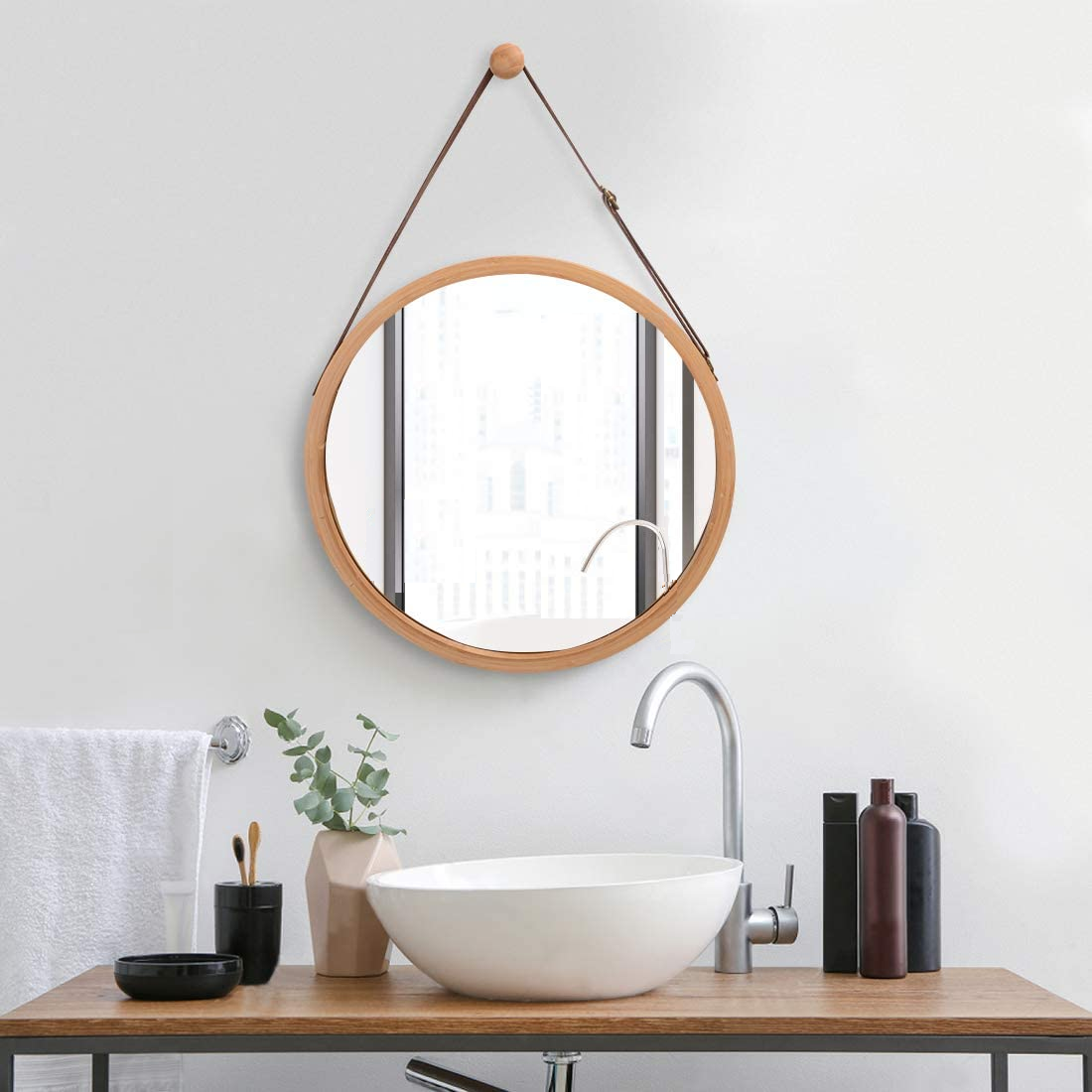 CARLA HOME Hanging Round Wall Mirror with a solid bamboo frame and adjustable leather strap, perfect for home decor.