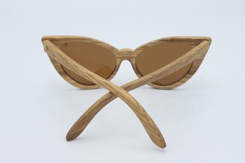 Stylish Cat Sunglasses made from zebra wood with polarized brown lenses, displayed in an eco-friendly wood box.