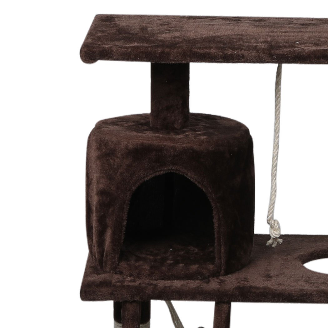 A tall 140cm dark brown cat tree with multiple levels, plush covering, and a natural sisal scratching post, designed for playful cats.