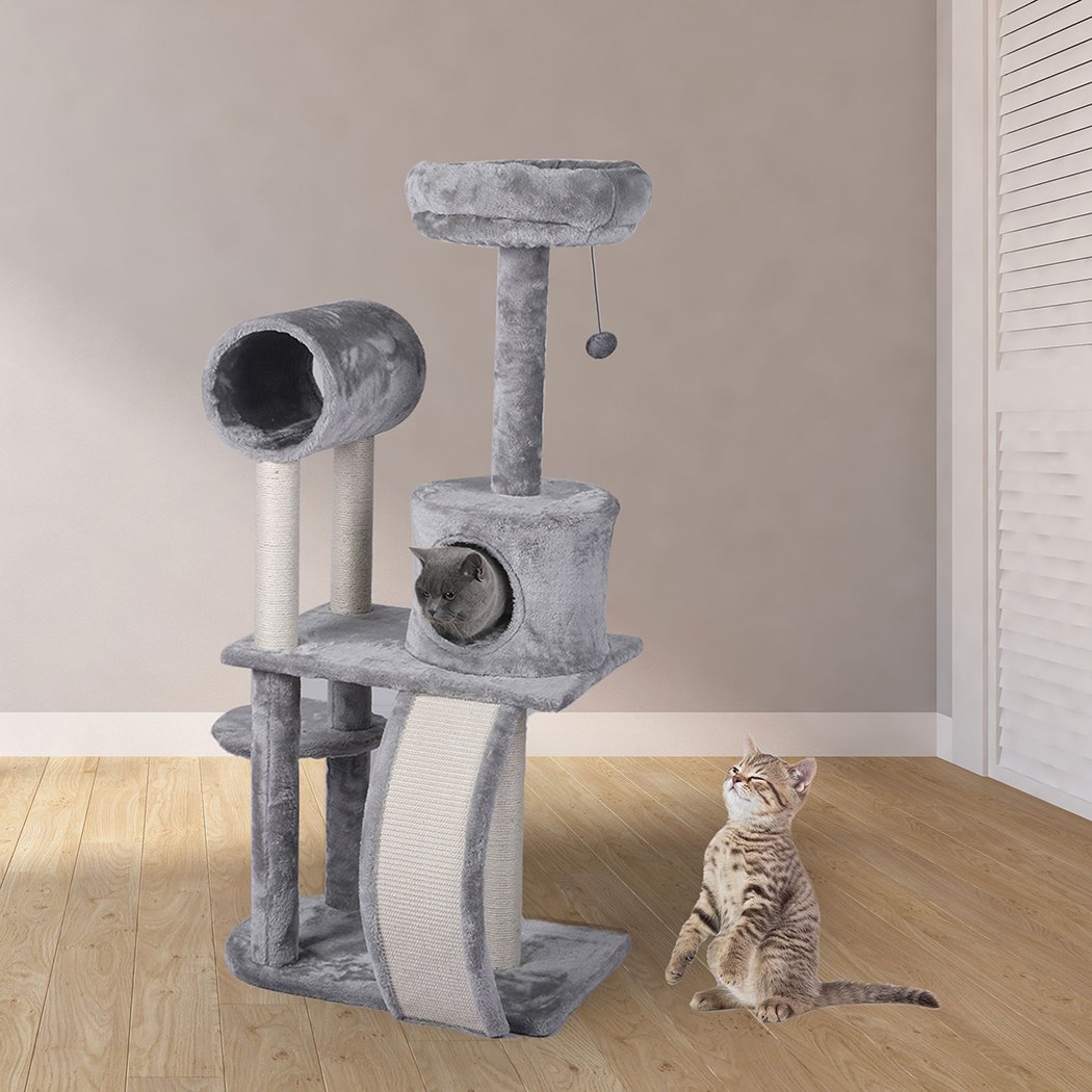 A grey multi-level cat tree tower with plush covering, featuring a scratching post wrapped in sisal and hanging toys for playful cats.