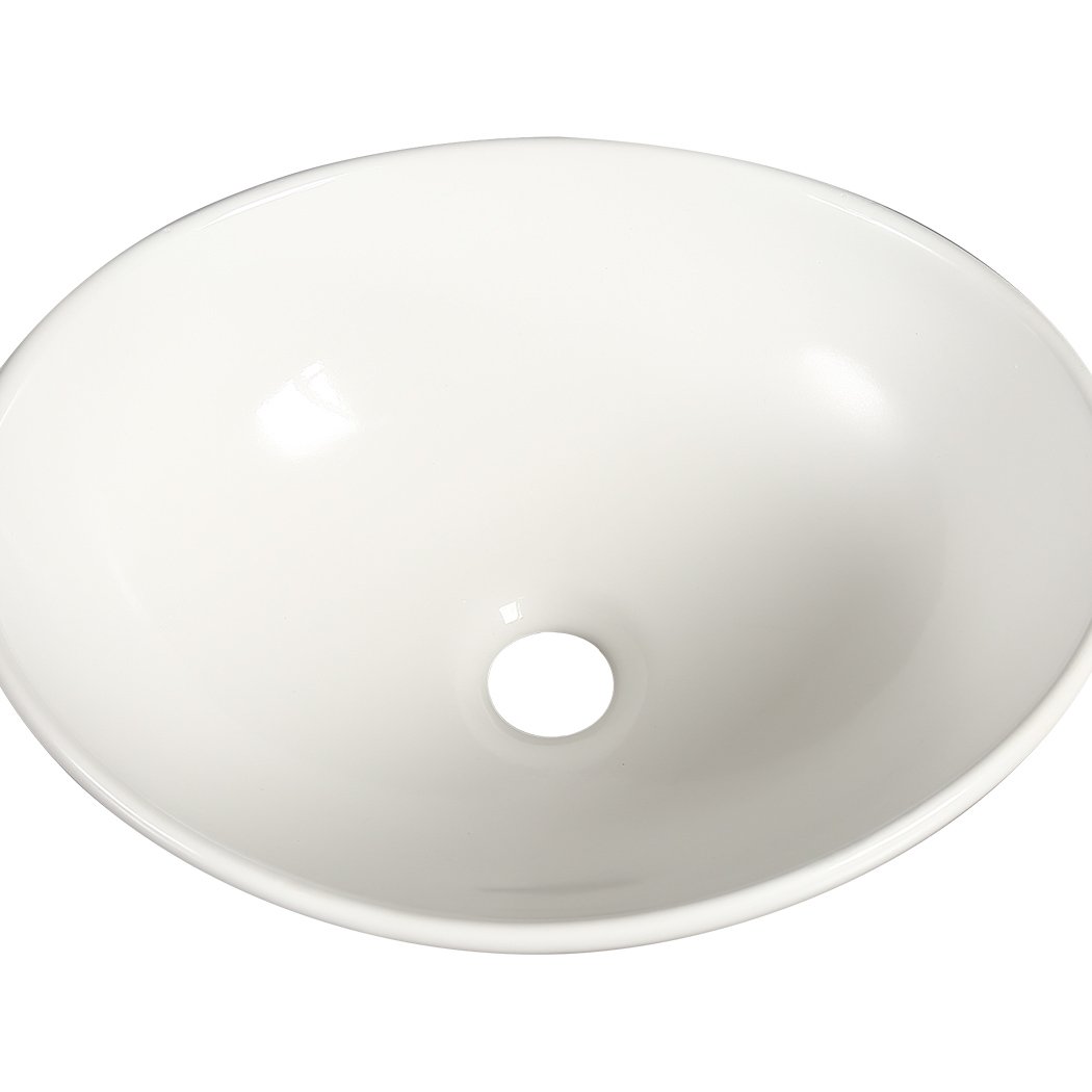 Elegant white ceramic basin for bathroom countertop with high gloss finish and anti-splash design.