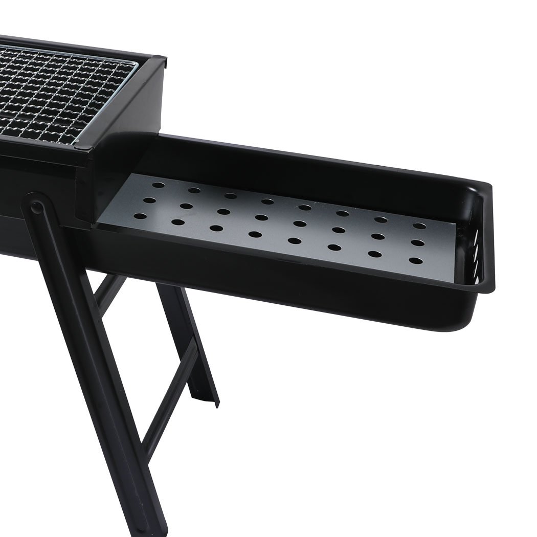 Portable Charcoal BBQ Grill with chrome steel top and air vents, perfect for outdoor cooking and camping.