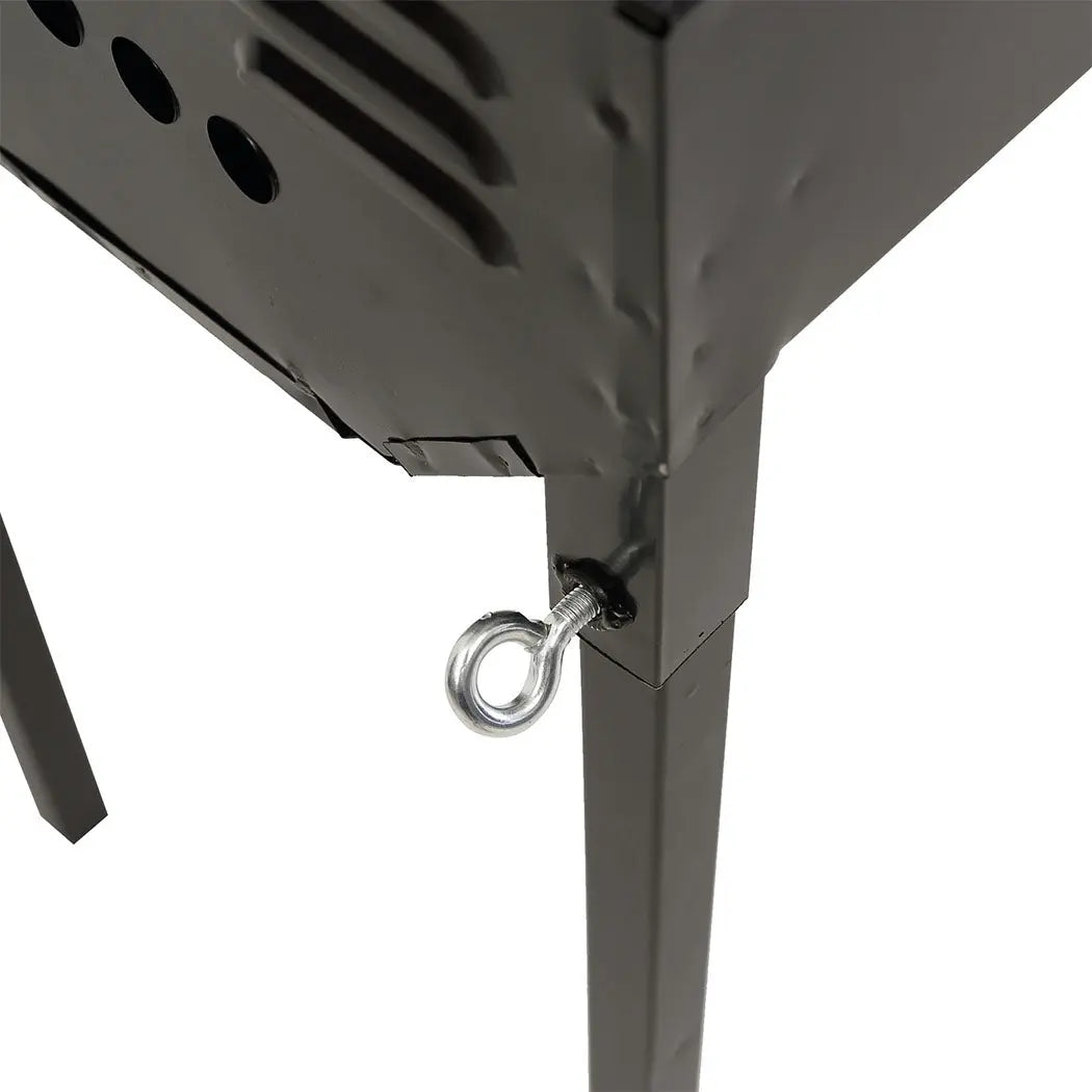 Portable Charcoal BBQ Grill with sturdy legs and handles, ideal for outdoor cooking and camping.