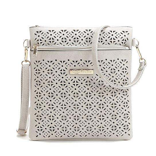 Classic Square Crossbody Bag featuring a floral cutout design, zippered pockets, and adjustable strap, made from durable vegan leather.