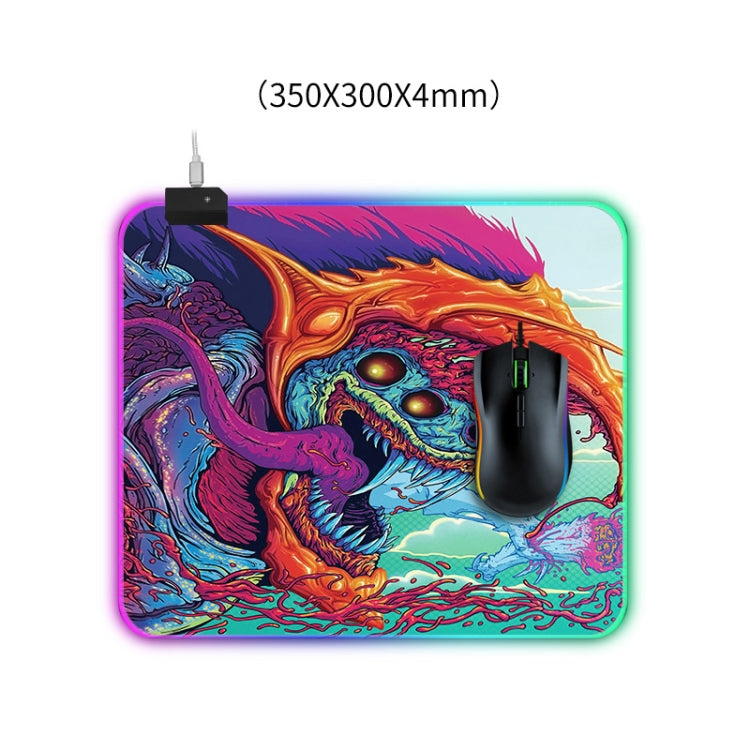 Computer Monster Pattern Illuminated Mouse Pad with vibrant colors and non-slip rubber base, ideal for gaming.