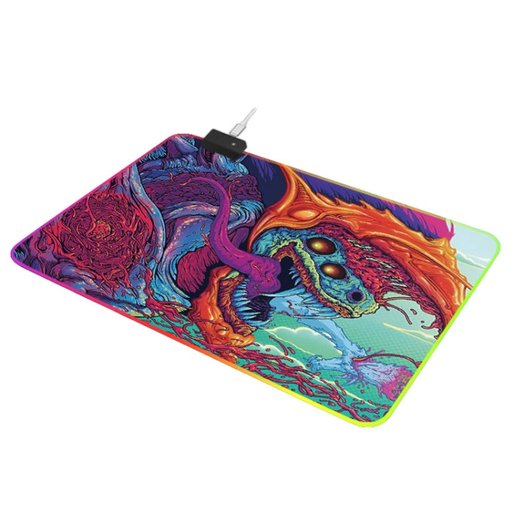 Computer Monster Pattern Illuminated Mouse Pad with vibrant colors and non-slip rubber base, ideal for gaming.