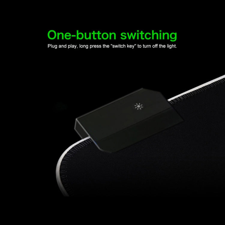 Computer Monster Pattern Illuminated Mouse Pad with vibrant colors and non-slip rubber base, ideal for gaming.